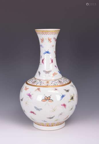 A FAMILLE ROSE 'HUNDRED BUTTERFLIES' BOTTLE VASE, GUANGXU MARK, QING DYNASTY