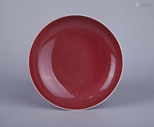 A COPPER RED-GLAZED DISH, QIANLONG MARK, QING DYNASTY