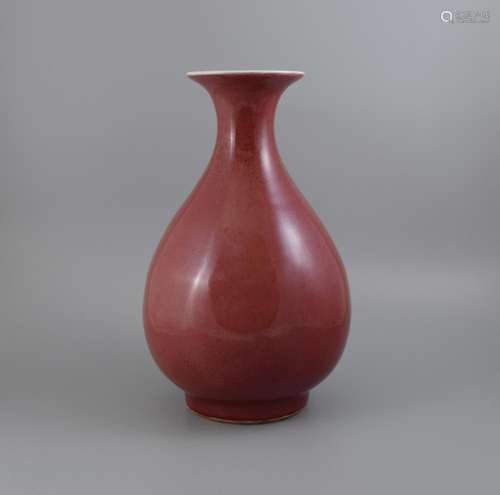 A COPPER-RED-GLAZED PEAR-SHAPED VASE, QIANLONG MARK, QING DYNASTY