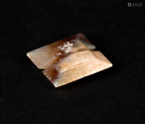 A WHITE AND RUSSET JADE PENDANT