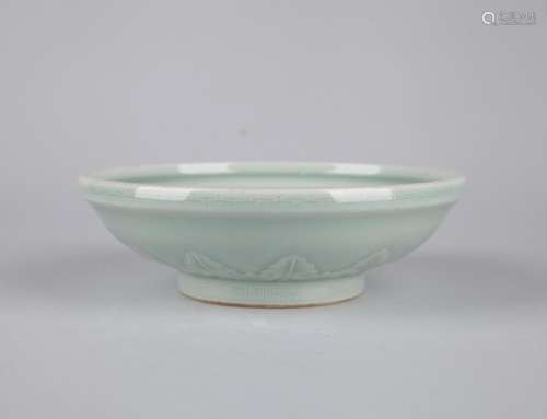 A CELADON-GLAZED BOWL, QIANLONG MARK, QING DYNASTY