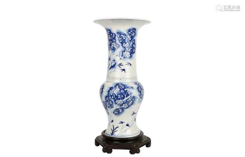 A Chinese Blue And White Porcelain Vase With Base