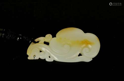 A Chinese Carved Jade Dragon Pendant