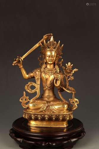 A BRONZE TIBETAN FIGURE OF MANJUSRI BODHISATTVA