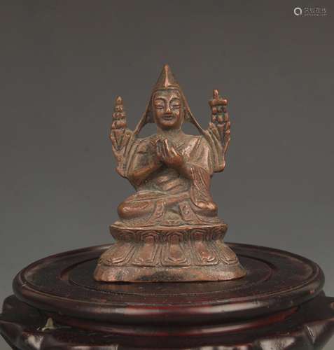 A FINELY CARVED BRONZE ZONGKABA FIGURE