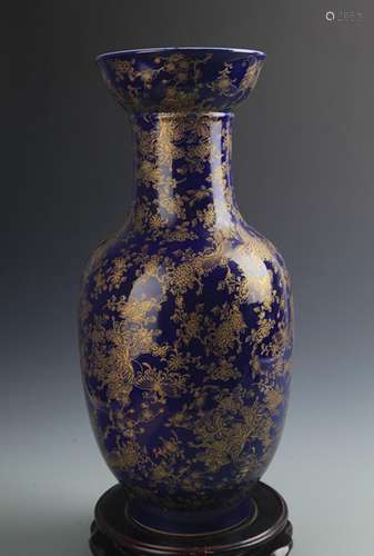 A FINE BLUE GROUND BUTTERFLY PATTERN VASE