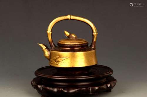 A BRONZE BAMBOO FIGURE BRONZE TEA POT