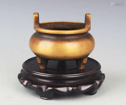 A TRIPOD FOOT DOUBLE EAR BRONZE CENSER