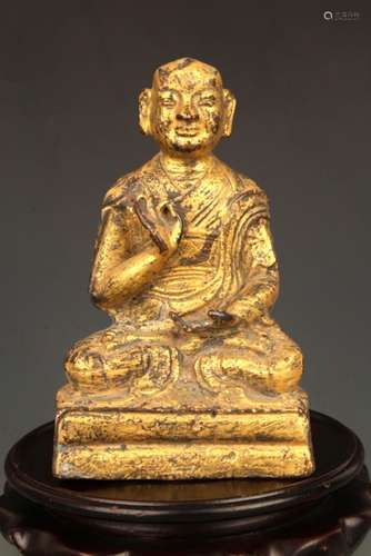 A FINE GILT BRONZE STATUE IN FIGURE OF GANDHARA