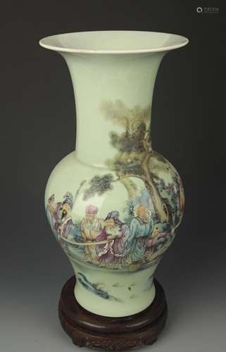 A GREEN GLAZE FAMILLE ROSE STORY PAINTED VASE