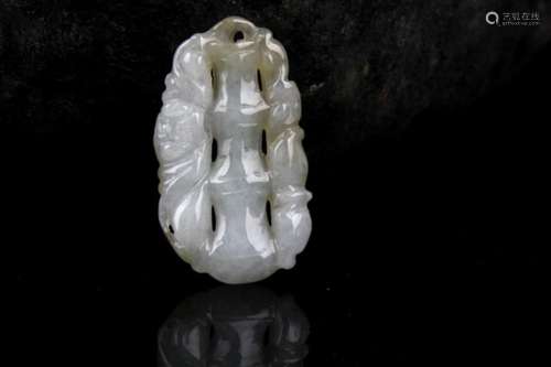 A FINELY CARVED JADE IN FIGURE OF BAMBOO