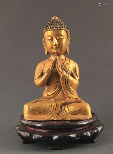 A BRONZE SEATED BUDDHA STATUE