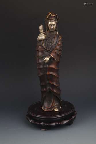 A TALL BRONZE GUAN YIN WITH LOTUS FIGURE