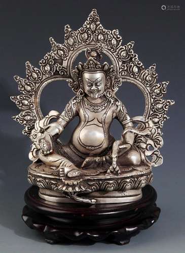 A FINELY CARVED DZAMABALA BUDDHA FIGURE