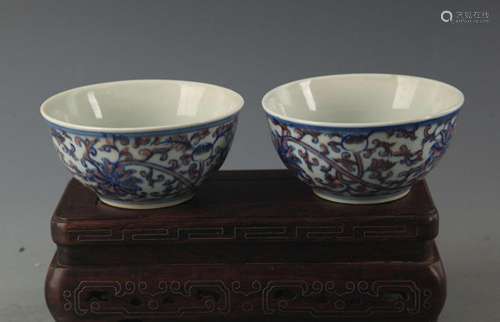 PAIR OF BLUE AND WHITE LOTUS PATTERN PORCELAIN CUP