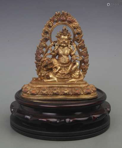 A FINE GILT BRONZE TREASURE KING STATUE