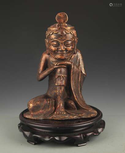 A BRONZE DEITY STATUE