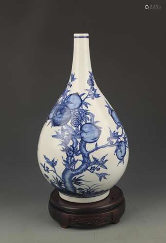 A LARGE BLUE AND WHITE TREE PAINTED VASE