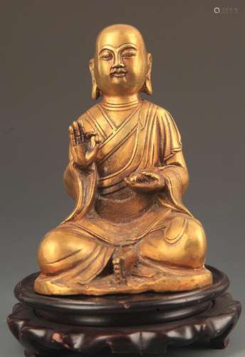 A FINE BRONZE TIBETAN TREASURE BUDDHA