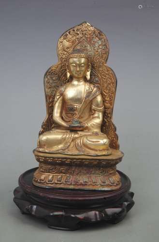 A FINE GILT BRONZE AKSHOBHYA BUDDHA WITH BASE