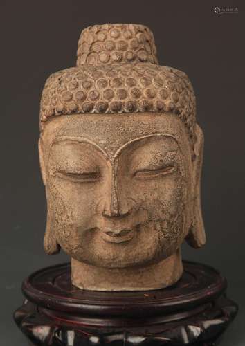 A FINELY CARVED STONE BUDDHA HEAD