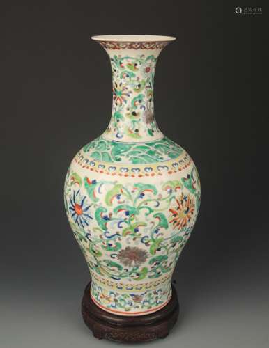 A FAMILLE VERTE FLOWER PAINTED PORCELAIN VASE