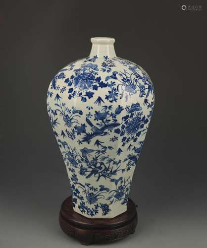 A BLUE AND WHITE, FLOWER AND BIRD PAINTED VASE