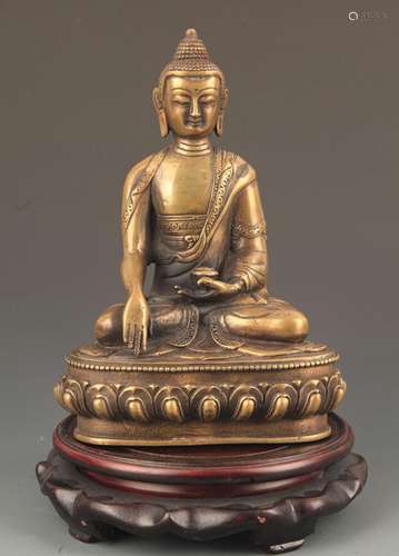 A FINE BRONZE TIBETAN BHAISAJYAGURU BUDDHA