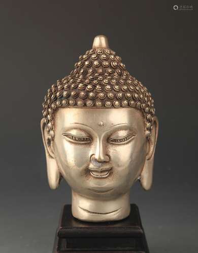 A FINELY CARVED BRONZE AKSHOBHYA BUDDHA HEAD