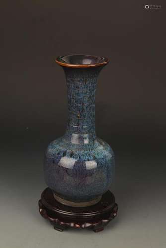 A DARK BLUE GLAZED PORCELAIN BOTTLE