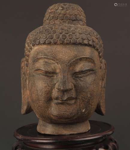 A FINELY CARVED BUDDHA STONE HEAD