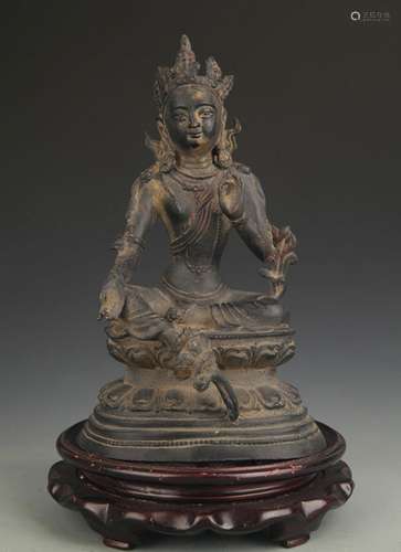 A BRONZE GREEN TARA STATUE