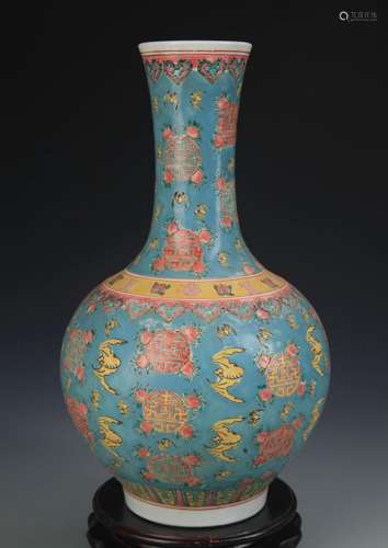 A TURQUOISE COLOR GROUND FAMILLE ROSE VASE