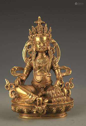 A FINE BRONZE TIBETAN JAMBHALA STATUE