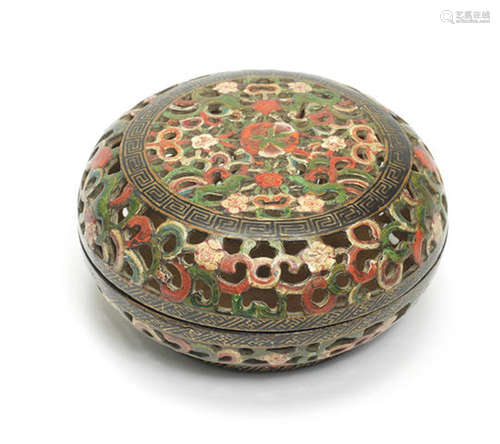 A rare reticulated painted-lacquer box and cover