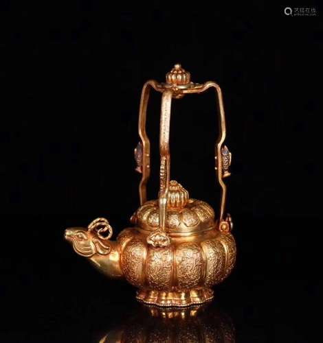 A GILT SHEEP-HEAD-SHAPED EWER