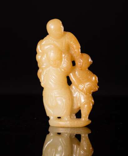 A HETIAN JADE LUCKY FIGURES ORNAMENT