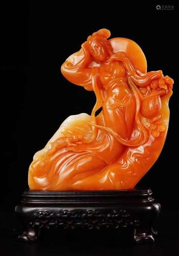 A SOAPSTONE CARVED LADY FIGURE