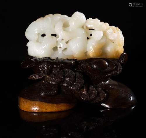 A HETIAN JADE OPENWORK WANGZICHENG ORNAMENT