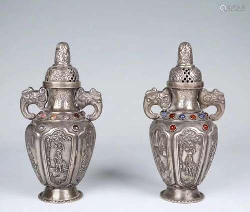 PAIR SILVER MOLDED BOTTLE VASES