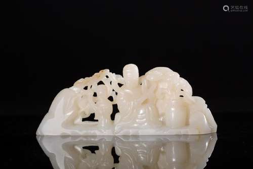 A HETIAN JADE OPENWORK SAN NIANGZI ORNAMENT