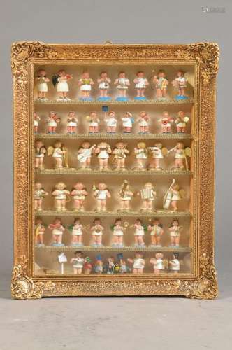 collector's cabinet with 48 The Ore Mountains figurines