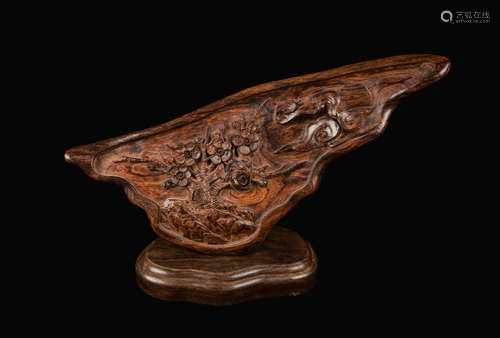 A Huanghuali Wood Ornament with Plum Blossom Carving