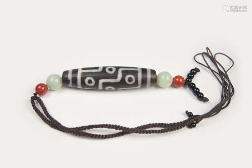 An Old Tibetan Pure Nine-Eye Dzi Bead with Weathered Grains