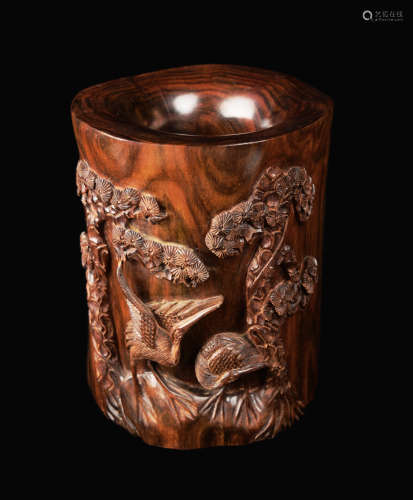 A Red Siamese Rosewood (Suanzhi) Paint Brush Pot with Pine and Crane Carvings