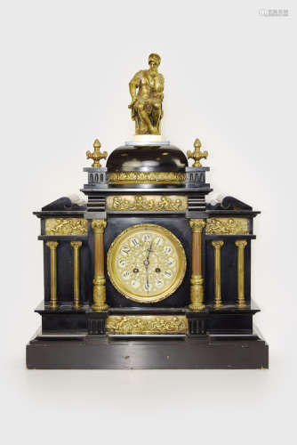 A Black Marble Mental Clock with Gilt Bronze Columns and Sculpture