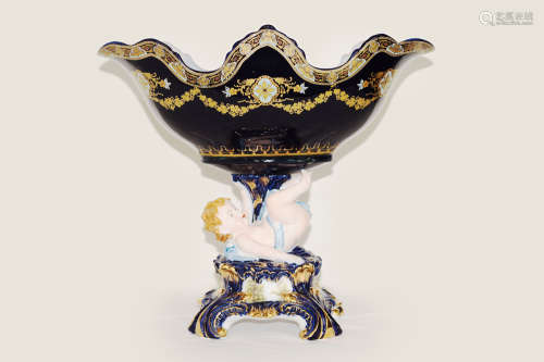 A Continental Indigo Porcelain Flower Shape Oval Compote with Angel