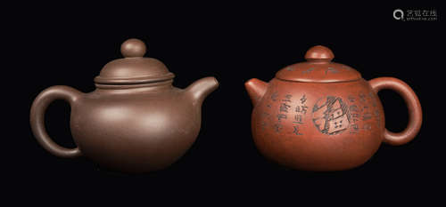 A Set of Two Yixing Clay Tea Pots, marked 