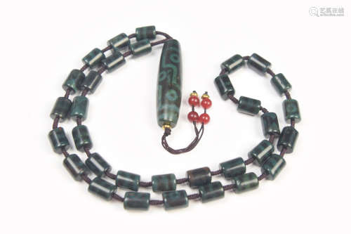 A Tibetan Katao Cinnabar Dzi Bead Necklace