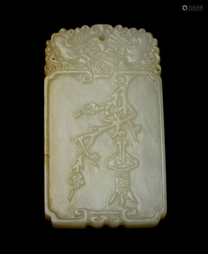 A Chinese White Jade Plaque with Plum Carving